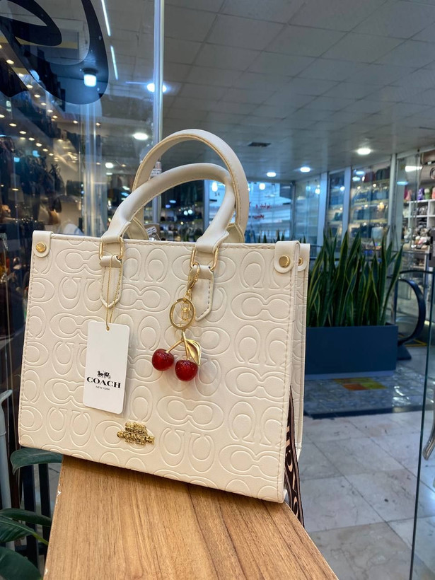 کیف زنانه لاکچری 💢کوچ مارک💢ابعاد حدودی:۳۰.۲۷
